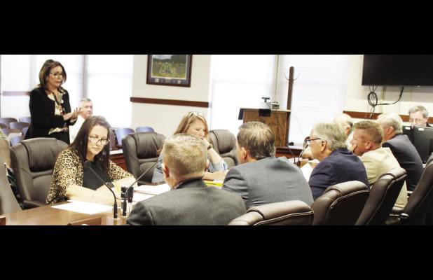 LEFT: District Judge Amy Ward addresses the Limestone County commissioners on Tuesday, April 23, stating that “too much time has been spent” on the routine bill process discussions “when there are other issues that are being more focused on in the county auditor’s office.”