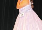 Junior Miss Queen, Rylee Gordon of Groesbeck 4-H in her formal wear gives a kiss and a strut to the judges and crowd at the LCFA Annual Miss Limestone County Fair Queen Pageant Monday, March 18.